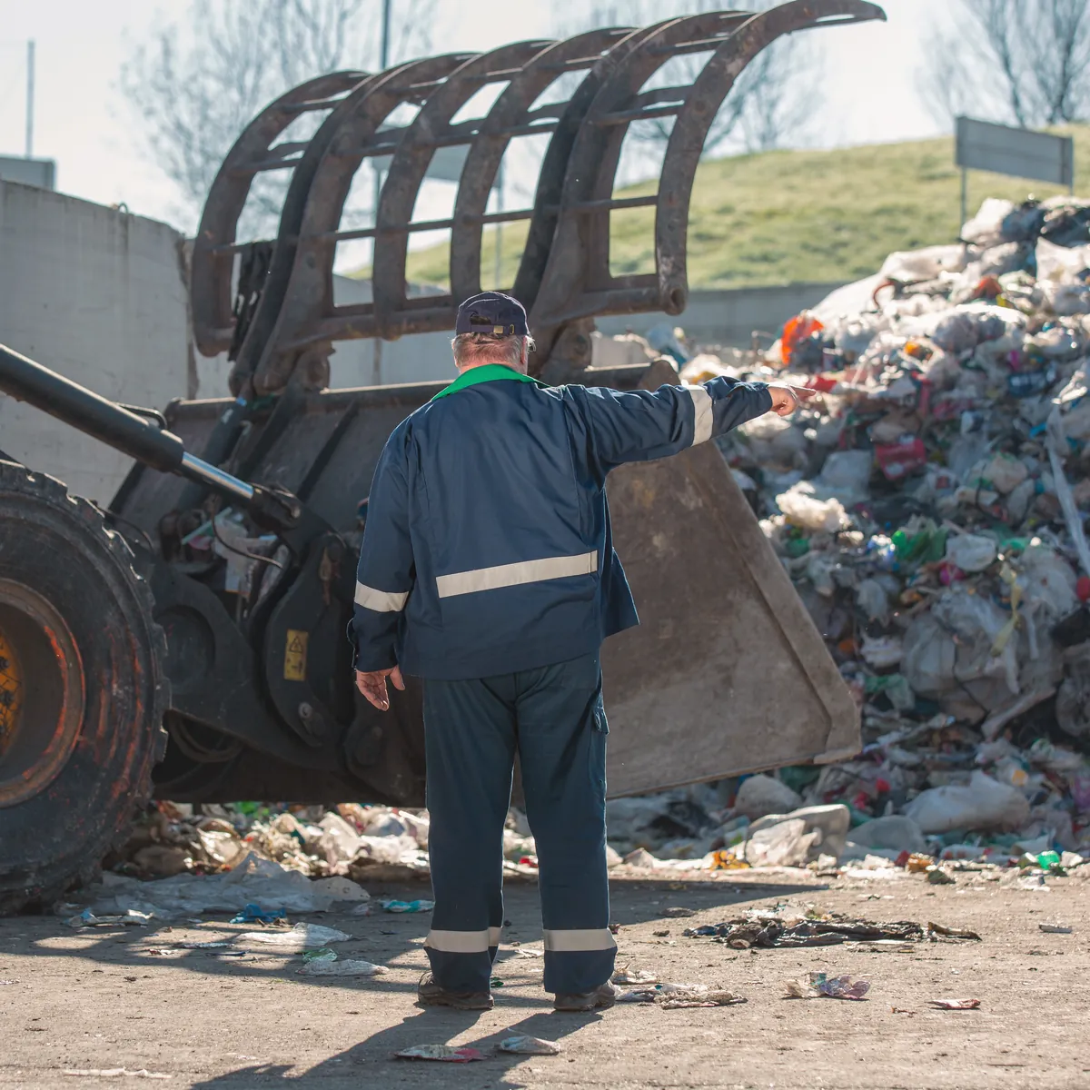 worker carrying heavy appliance